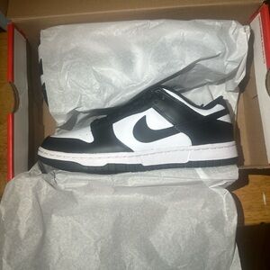 Black and white dunk lows women.